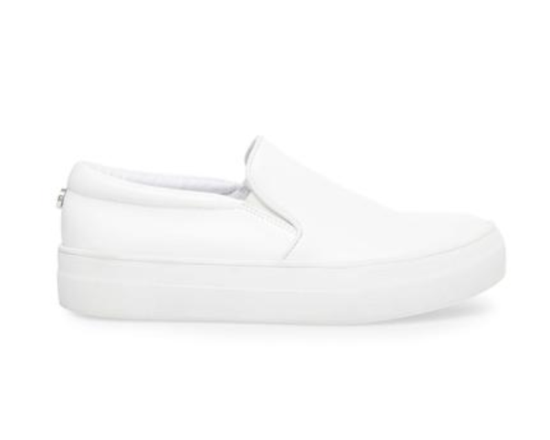 Travel style white slip-on sneakers